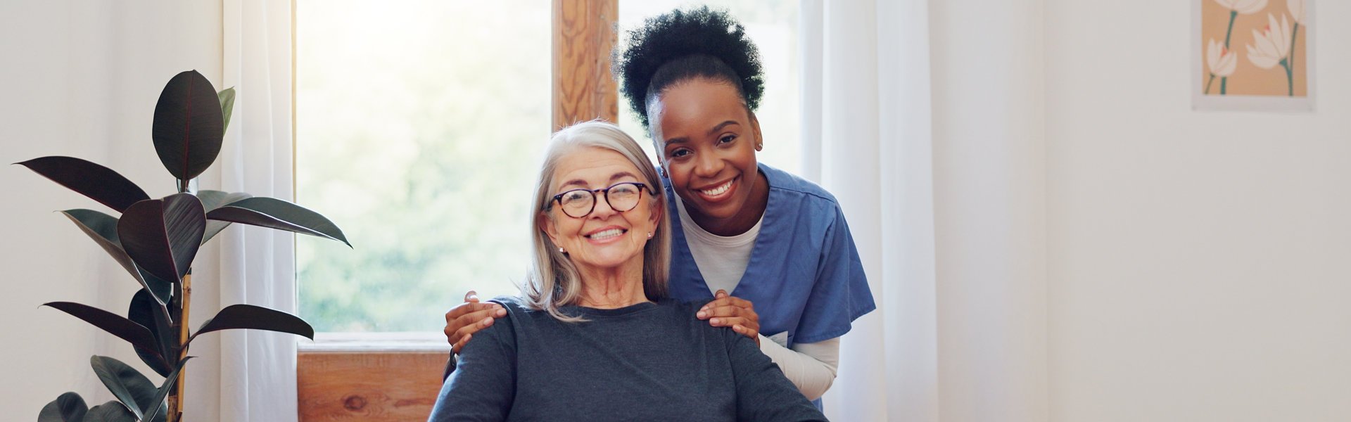 nurse and elderly woman smiling